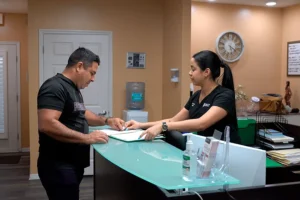 Patient completing paperwork at Tampa Health Solutions