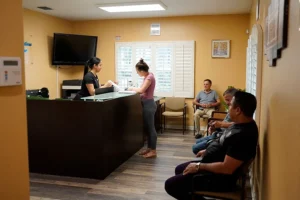 Patient check-in at the Tampa Health Solutions front desk